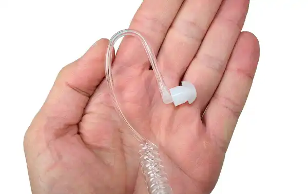 Earphone with transparent acoustic tube.